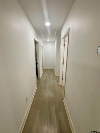 a bedroom with bed and window