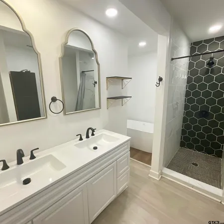 a bath tub sitting in a bathroom