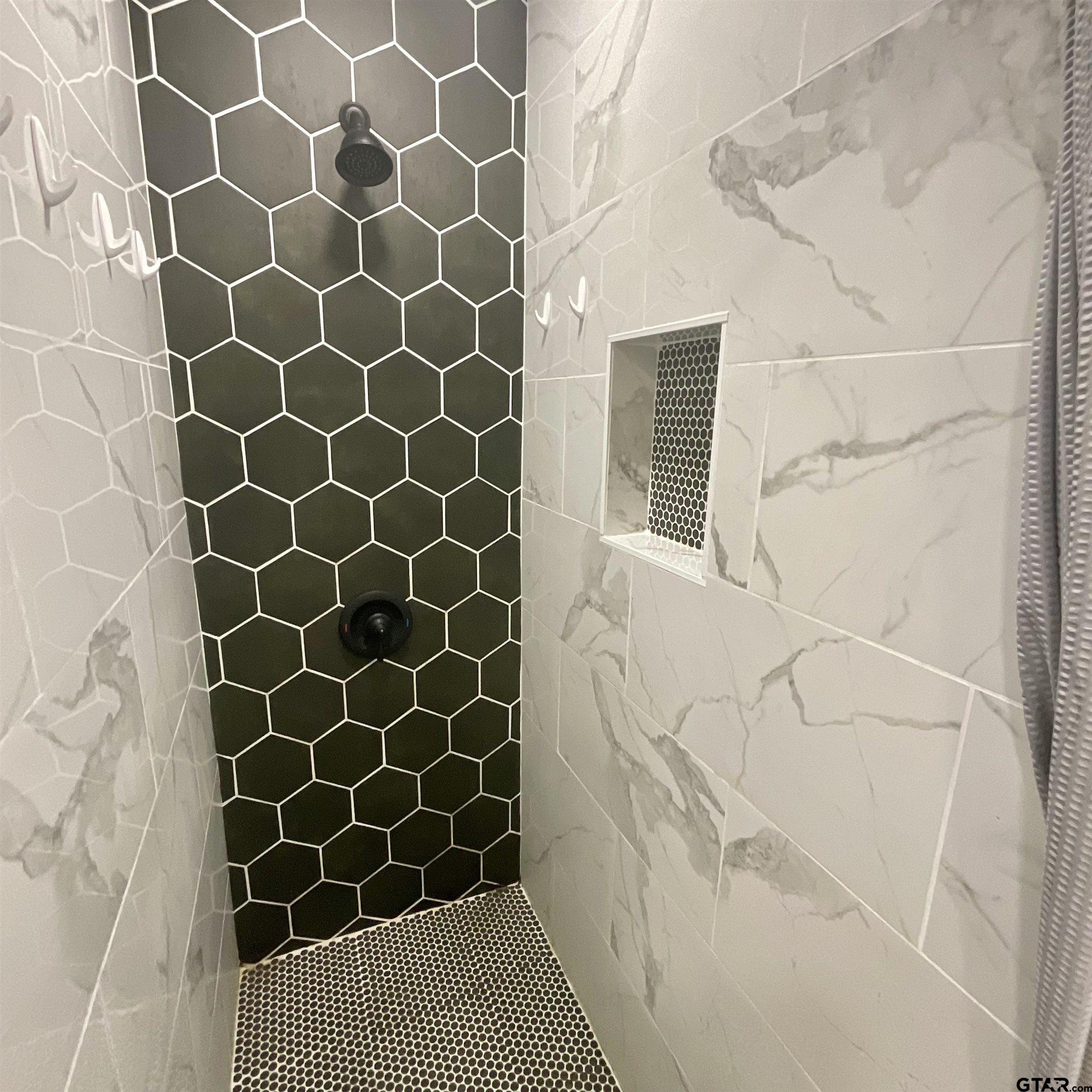 151 Patton Lane Tyler, TX 75704 - Photo 5 of 26 a bathroom with a shower