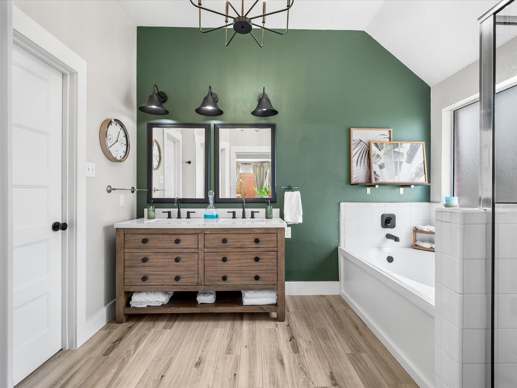 4023 Tigris Ridge Drive Katy, TX 77449 - Photo 20 of 39 The fully updated primary ensuite showcases a dual sink vanity, soaking tub, and separate shower with updated fixtures (2025–2026).