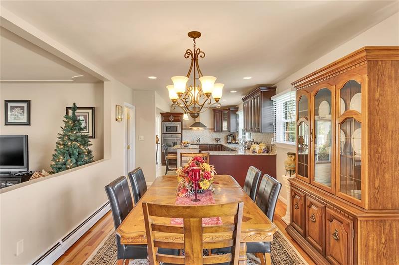 154 Bryson Road Gibsonia, PA 15044 - Photo 12 of 41 a view of a dining room with furniture window and wooden floor