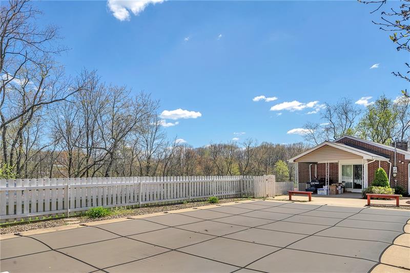 154 Bryson Road Gibsonia, PA 15044 - Photo 32 of 41 a front view of a house with a garden