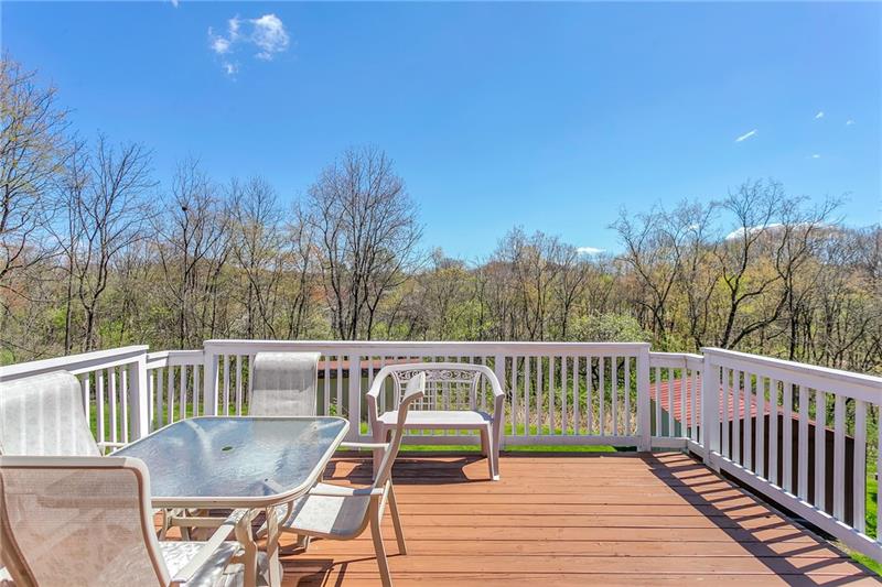 154 Bryson Road Gibsonia, PA 15044 - Photo 33 of 41 a view of a chairs and table on the deck