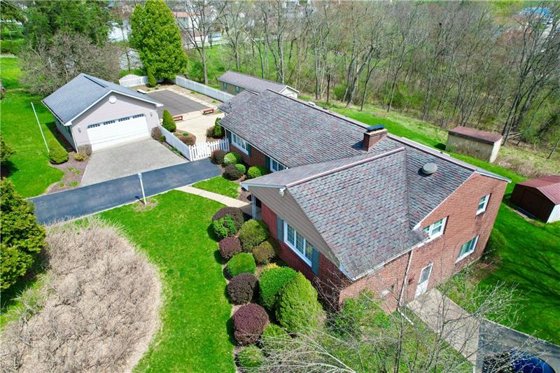 154 Bryson Road Gibsonia, PA 15044 - Photo 34 of 41 an aerial view of a house with garden space and street view