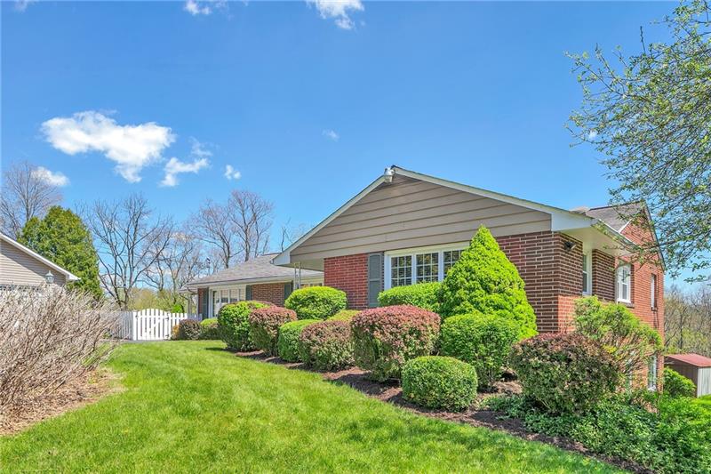 154 Bryson Road Gibsonia, PA 15044 - Photo 36 of 41 a view of a house with a yard and plants
