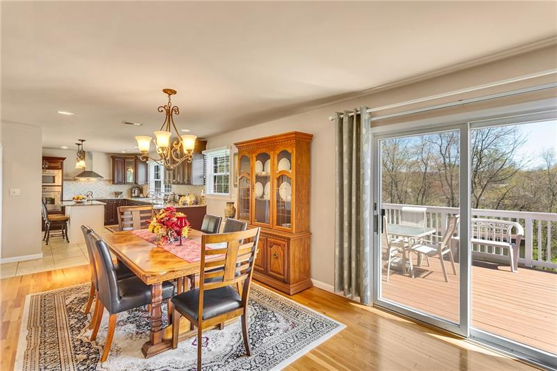 154 Bryson Road Gibsonia, PA 15044 - Photo 10 of 41 a dining room with furniture a chandelier and wooden floor