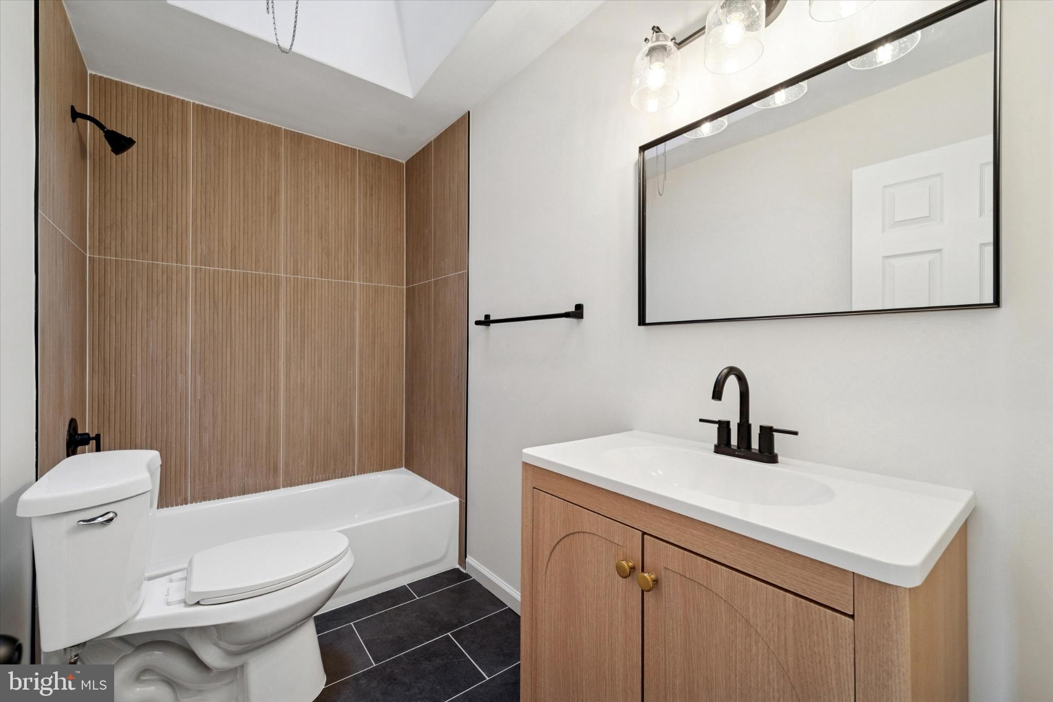 247 Coverly Road Lansdowne, PA 19050 - Photo 4 of 25 Sleek modern bathroom with natural accents.