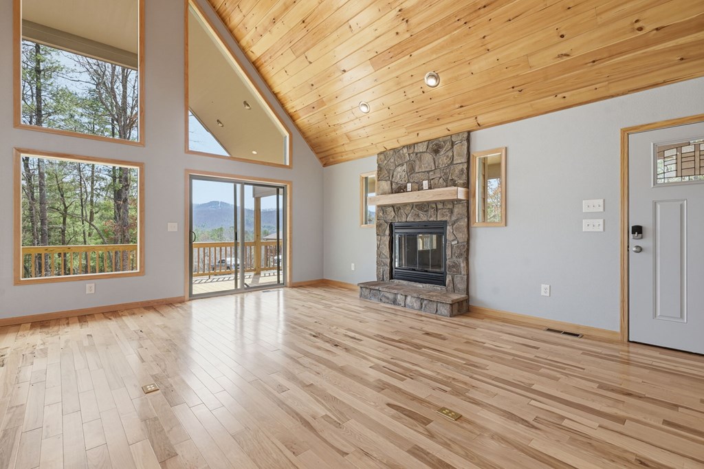 55 Heidis Run Murphy, NC 28906 - Photo 14 of 53 a view of an empty room with wooden floor and a window