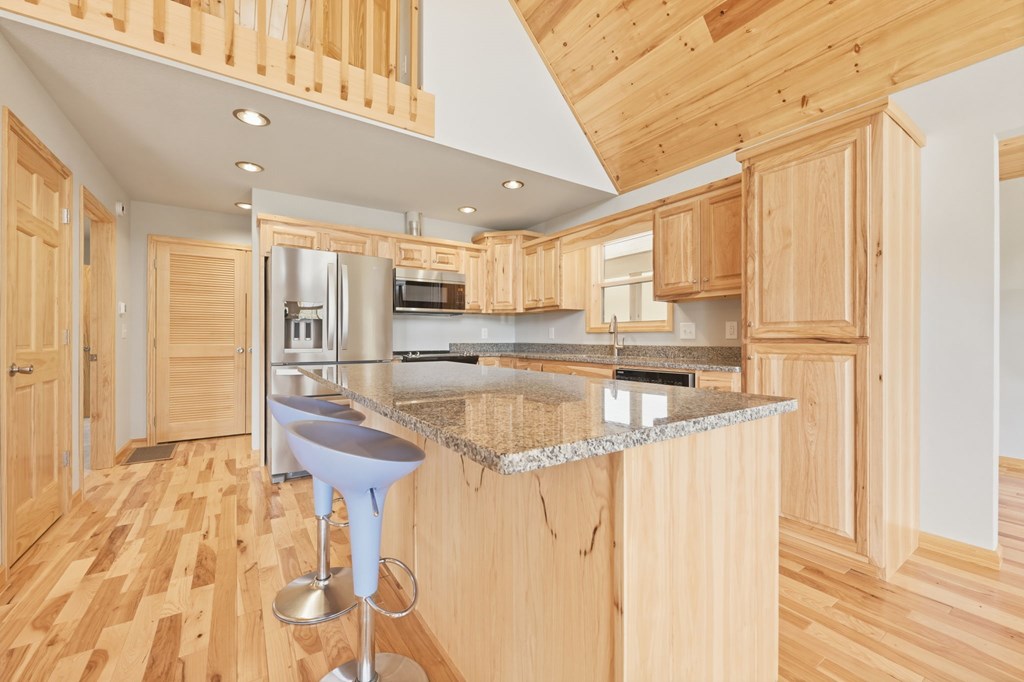 55 Heidis Run Murphy, NC 28906 - Photo 21 of 53 a kitchen with stainless steel appliances granite countertop a refrigerator and a sink