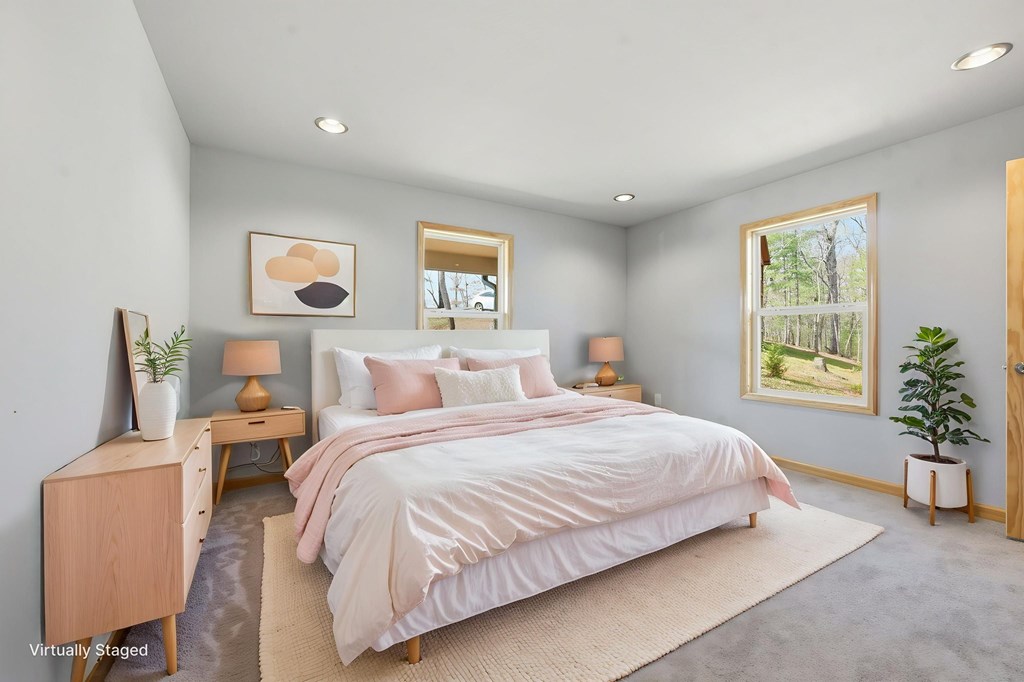 55 Heidis Run Murphy, NC 28906 - Photo 24 of 53 a bedroom with a bed and a potted plant