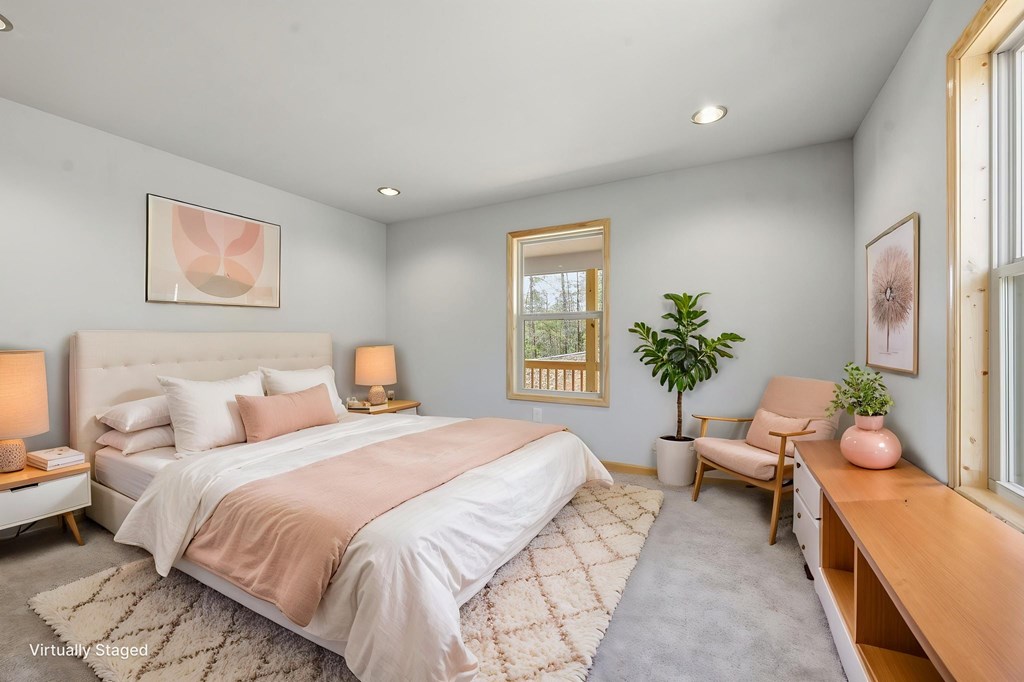 55 Heidis Run Murphy, NC 28906 - Photo 27 of 53 a bedroom with a bed and a couch