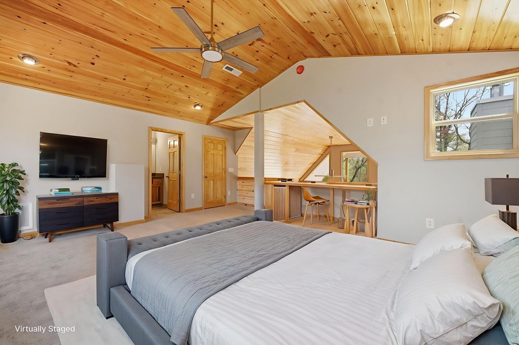 55 Heidis Run Murphy, NC 28906 - Photo 38 of 53 a bedroom with a bed and a flat screen tv