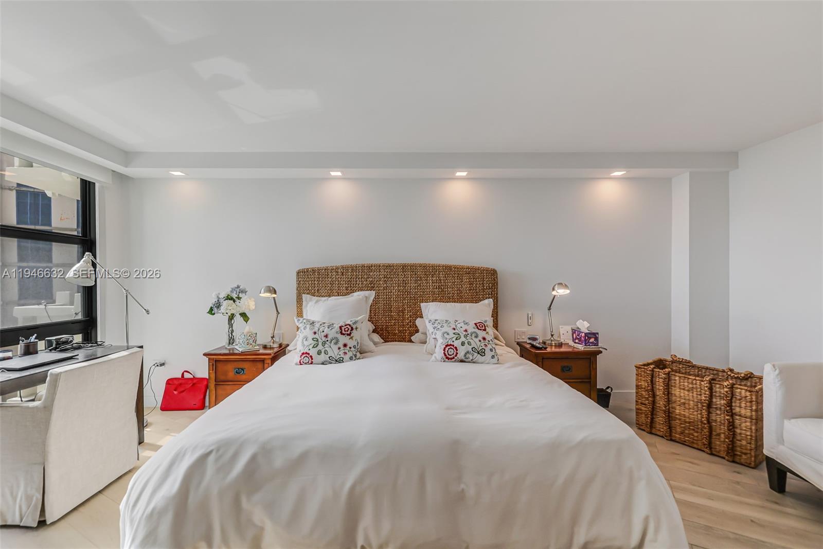 1121 Crandon Boulevard, Unit F802 Key Biscayne, FL 33149 - Photo 15 of 36 a bedroom with bed and a flat tv screen