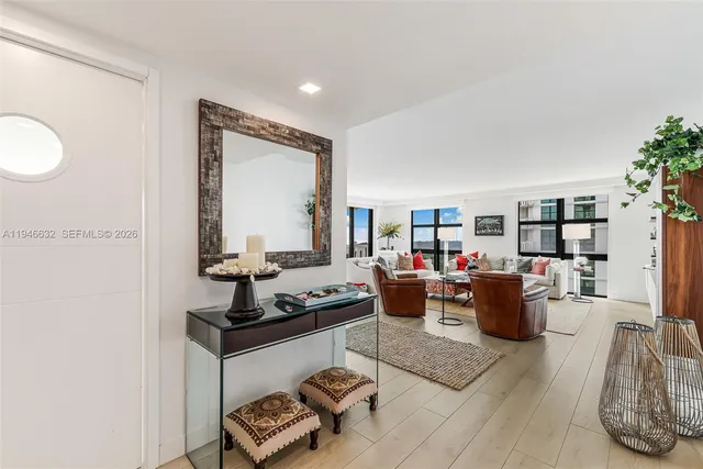 a living room with furniture and a window