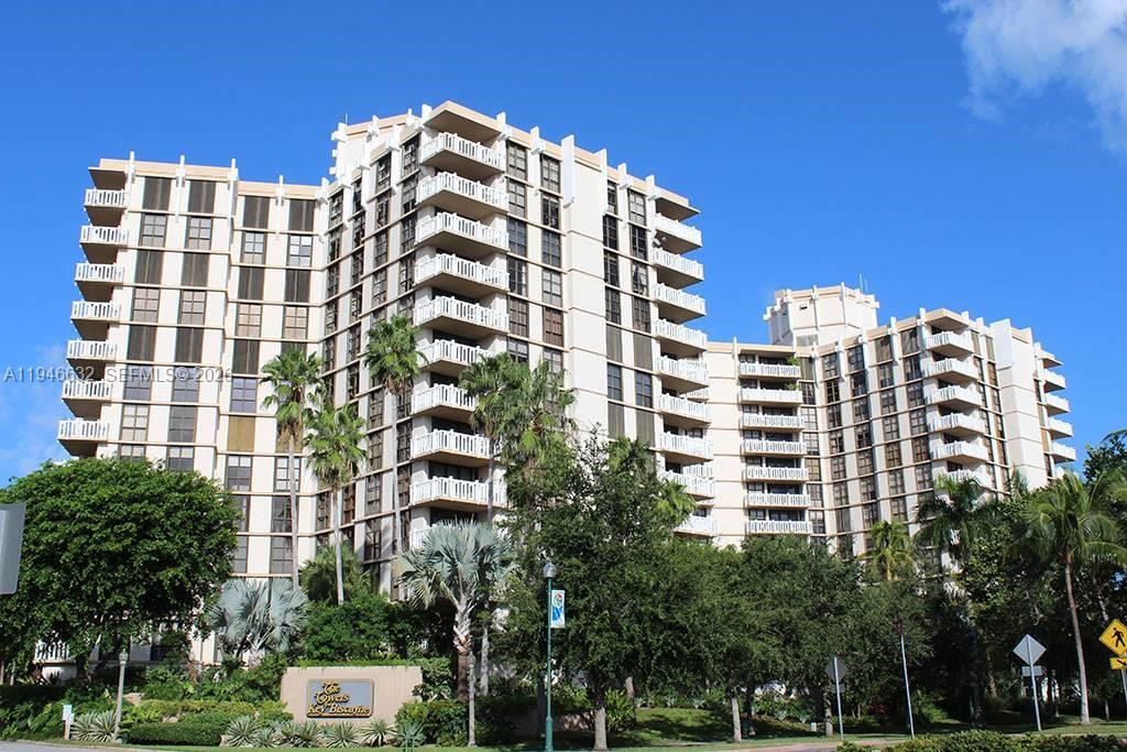 1121 Crandon Boulevard, Unit F802 Key Biscayne, FL 33149 - Photo 28 of 36 a front view of a building