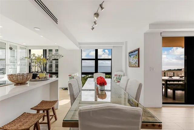 a living room with furniture fireplace and window