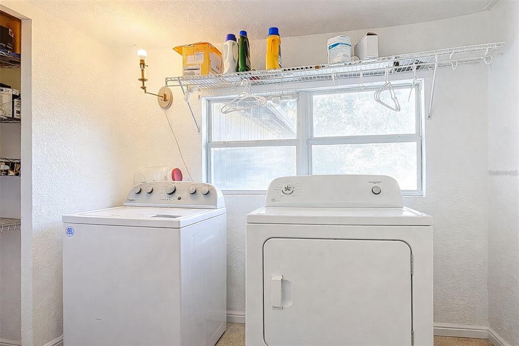 43430 Cooter Pond Road DeLand, FL 32720 - Photo 20 of 37 a utility room with dryer and washer