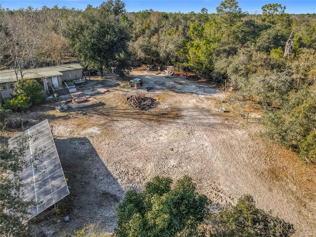 43430 Cooter Pond Road DeLand, FL 32720 - Photo 28 of 37 a view of a yard with wooden fence