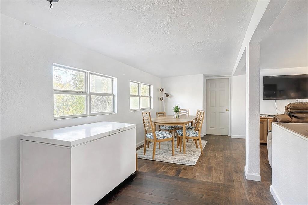 43430 Cooter Pond Road DeLand, FL 32720 - Photo 6 of 37 a view of a dining room with furniture and a window