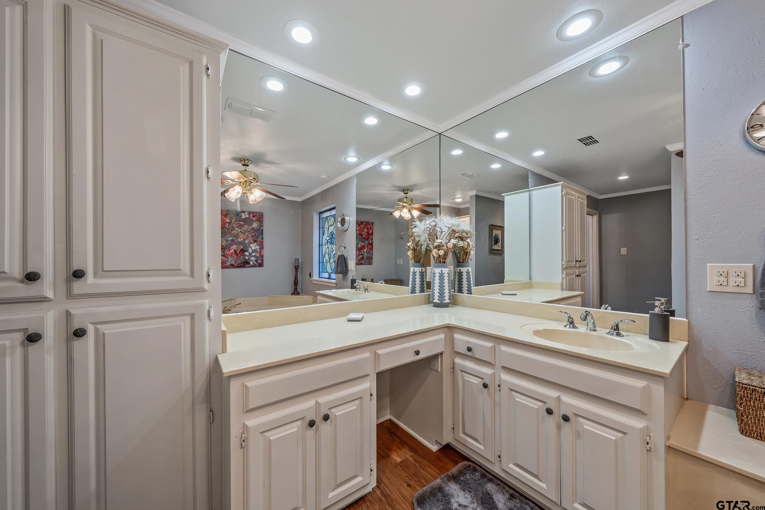 3309 Trafalgar Square Tyler, TX 75701 - Photo 15 of 23 a bathroom with a sink double vanity granite and a mirror