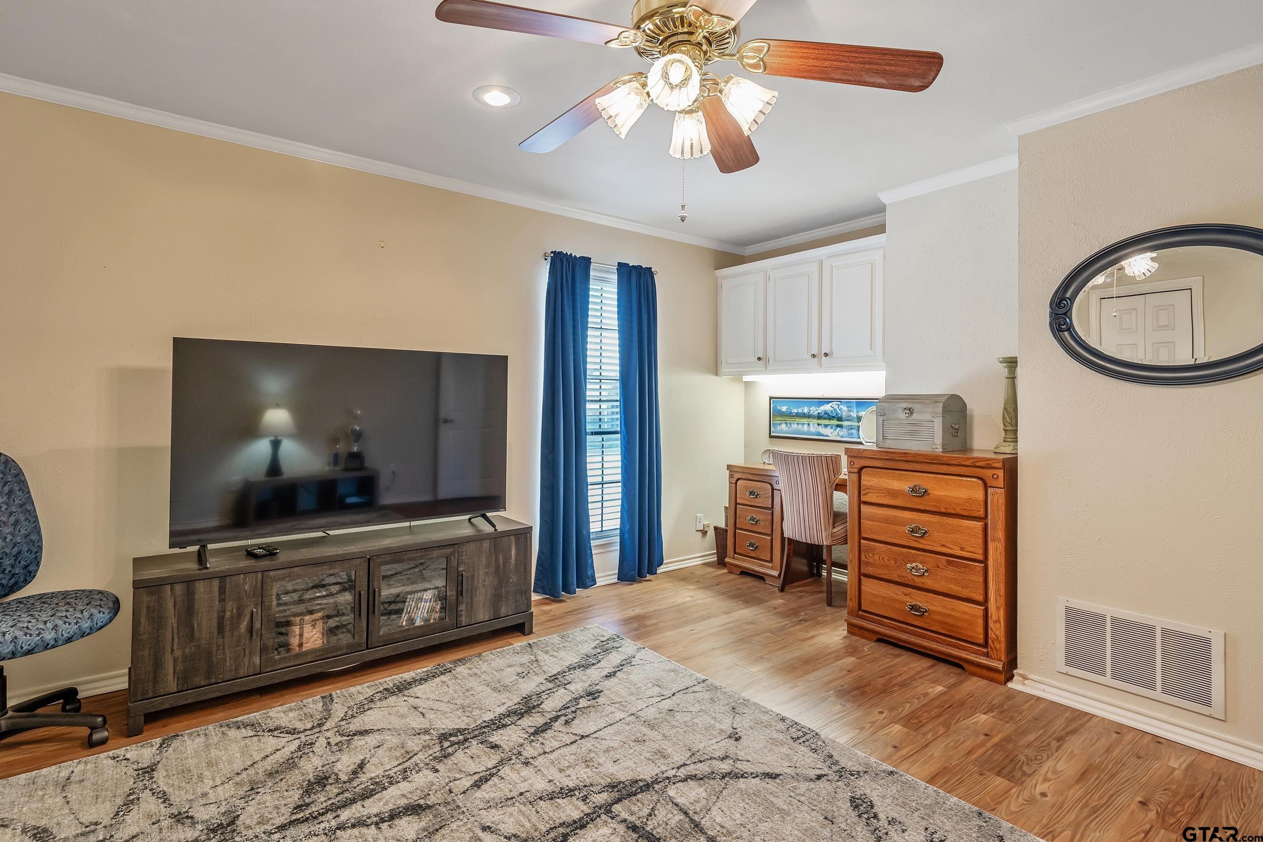3309 Trafalgar Square Tyler, TX 75701 - Photo 18 of 23 a view of a livingroom with furniture and a flat screen tv