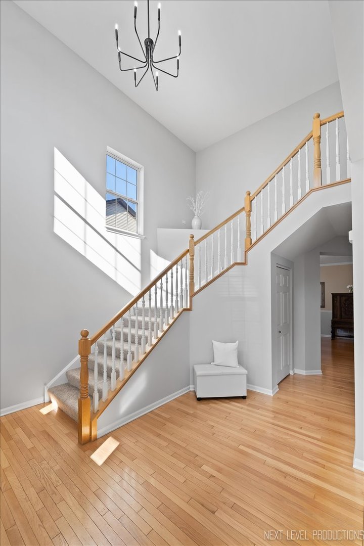 3520 Timber Creek Lane Naperville, IL 60565 - Photo 18 of 50 a view of entryway and hall with wooden floor