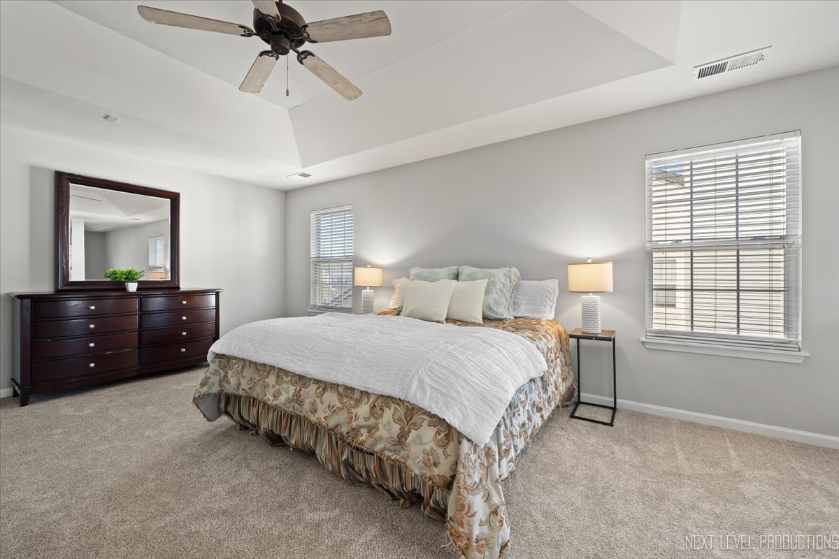 3520 Timber Creek Lane Naperville, IL 60565 - Photo 22 of 50 a spacious bedroom with a bed and a dresser