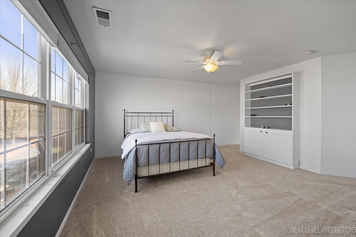 3520 Timber Creek Lane Naperville, IL 60565 - Photo 26 of 50 a bedroom with a bed and a window