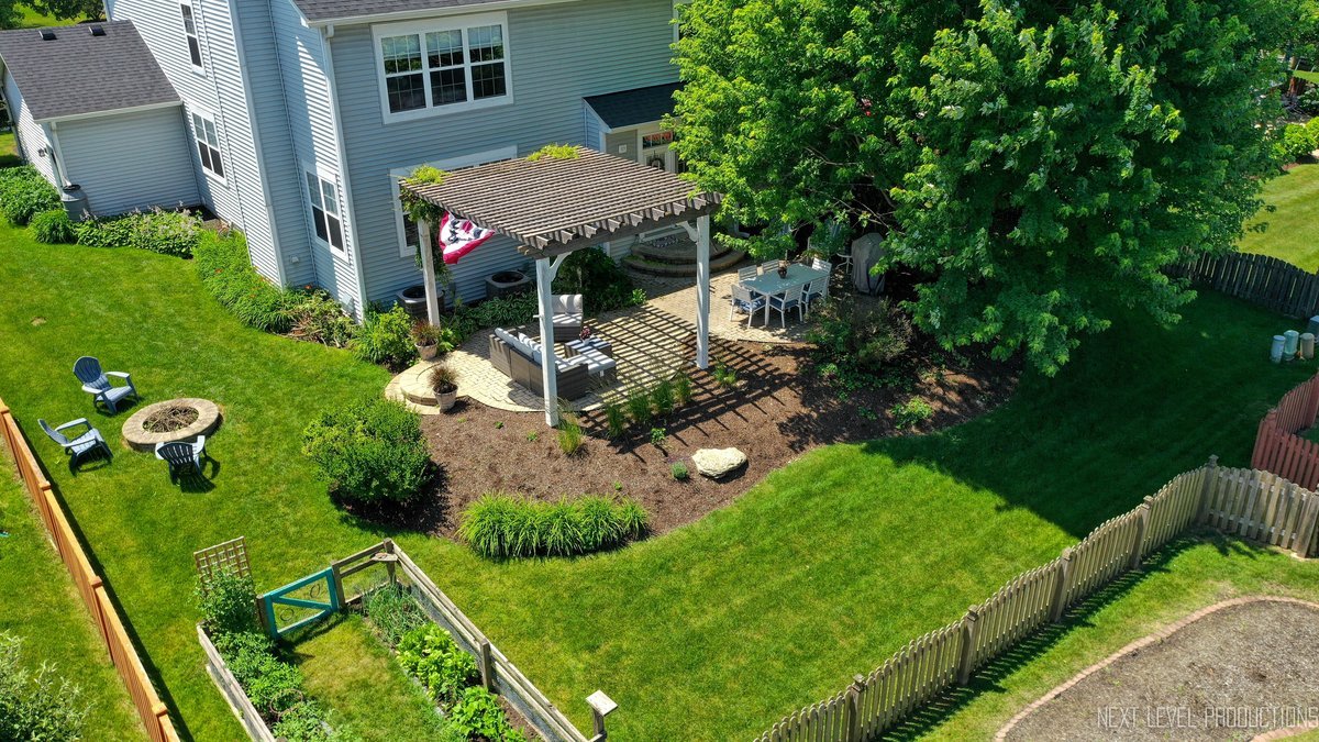 3520 Timber Creek Lane Naperville, IL 60565 - Photo 33 of 50 a view of a backyard with plants