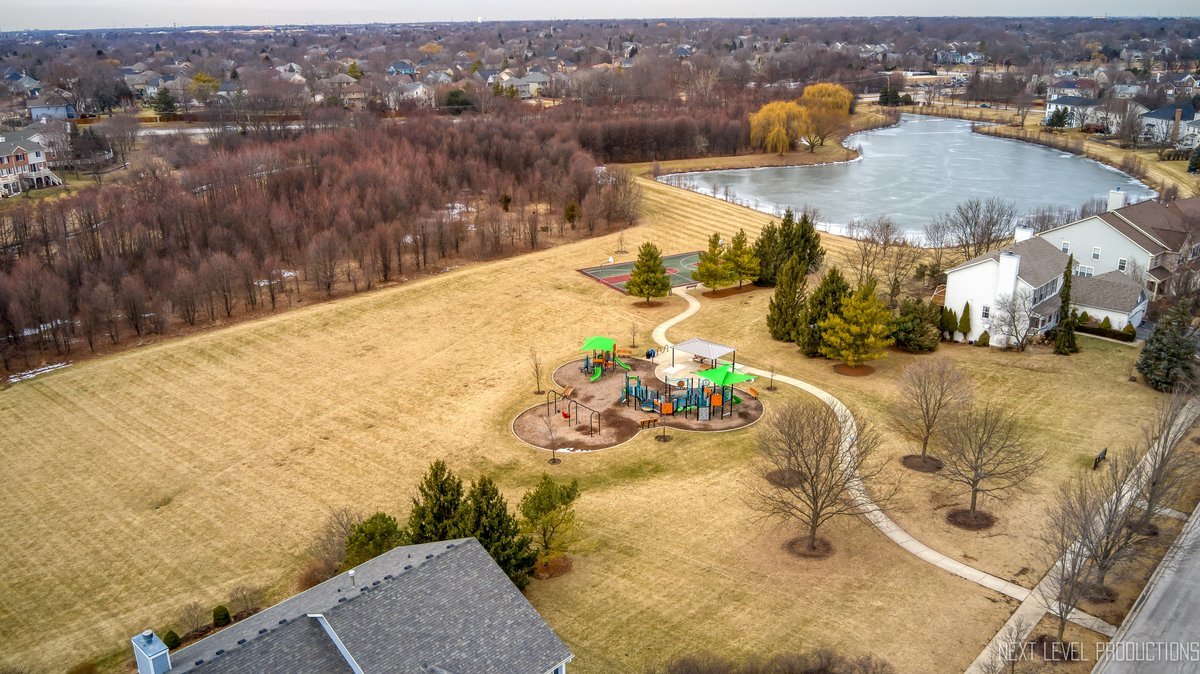 3520 Timber Creek Lane Naperville, IL 60565 - Photo 45 of 50 a view of a swimming pool with a terrace