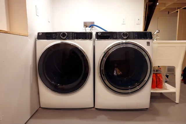 a utility room with dryer and washer