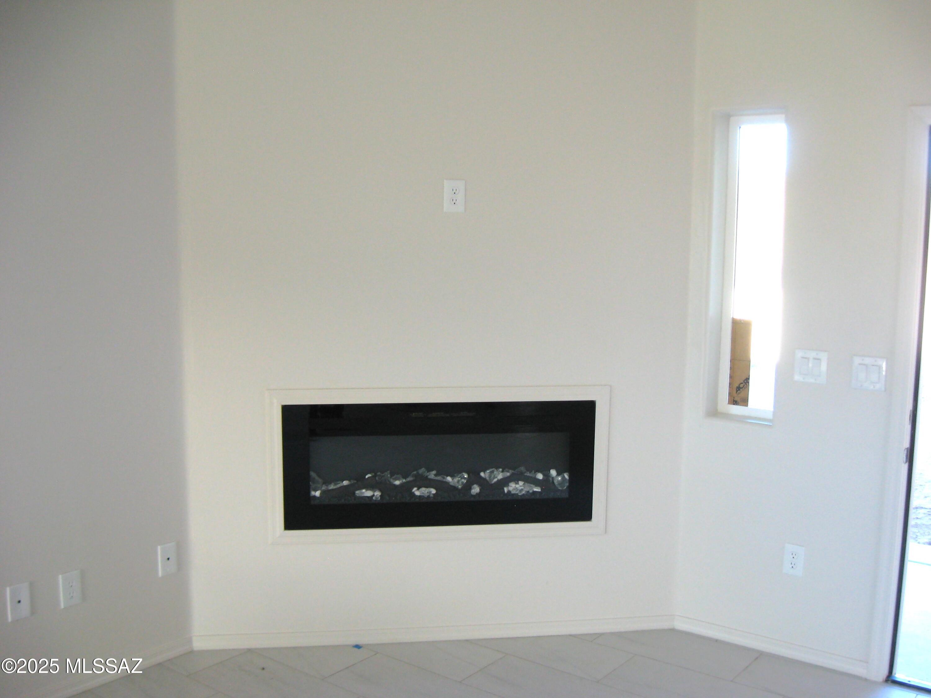1734 Circulo Badajada Rio Rico, AZ 85648 - Photo 10 of 32 a close view of a fireplace
