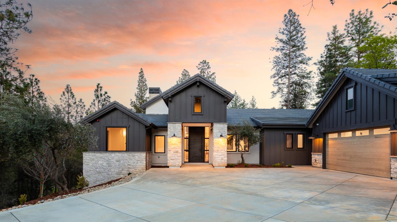 1632 The Point Meadow Vista, CA 95722 - Photo 51 of 60 a front view of a house with a yard and garage