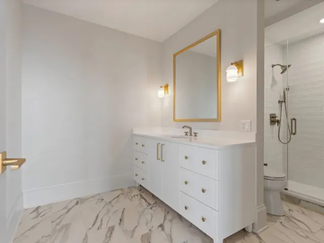 a white bath tub sitting in a bathroom