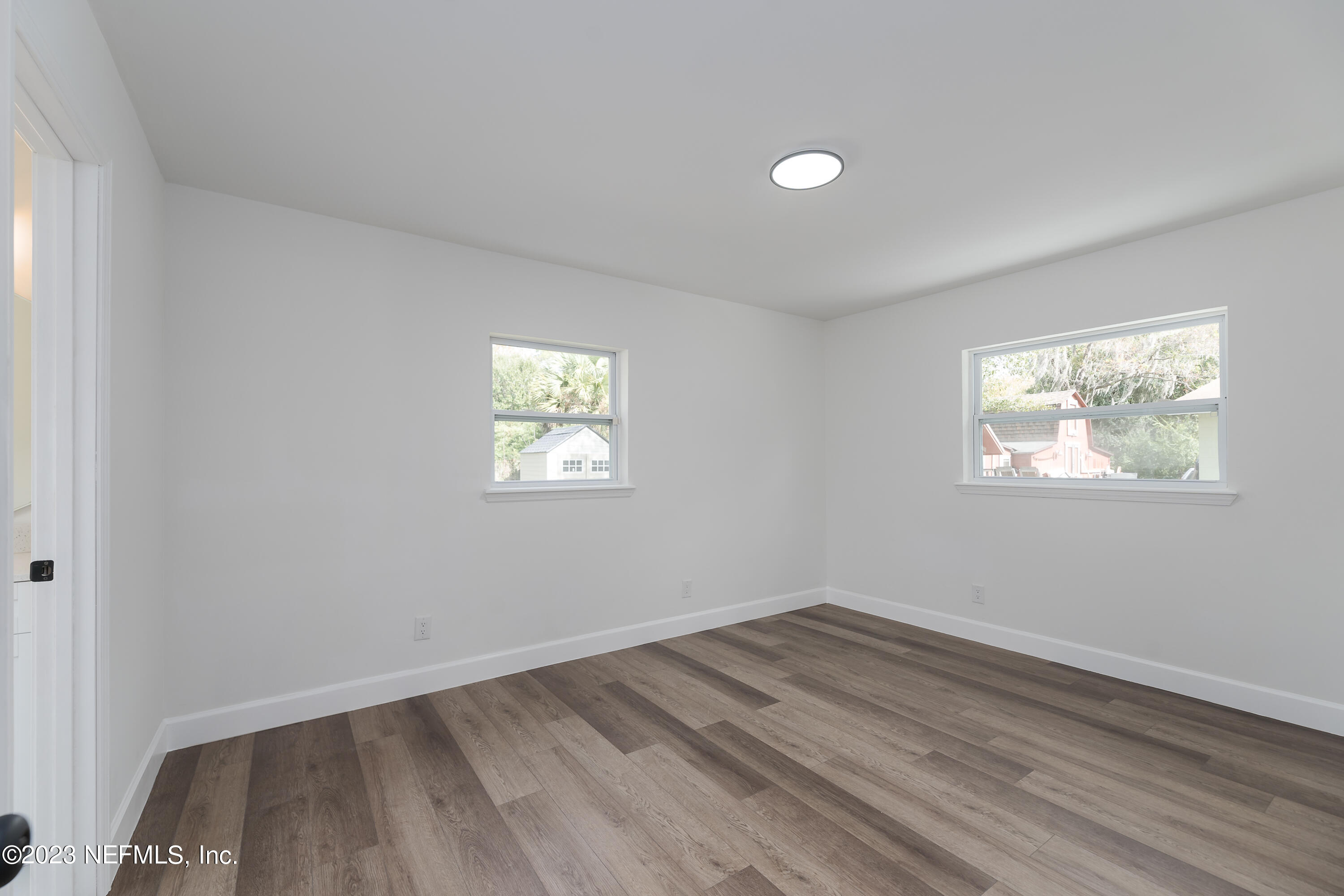 7425 Centauri Road Jacksonville, FL 32210 - Photo 15 of 23 an empty room with a window