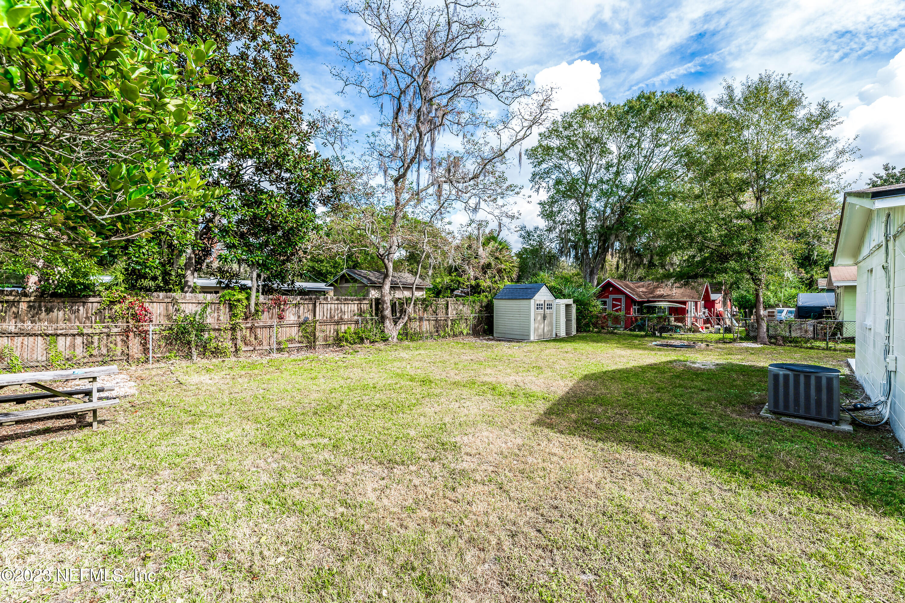 7425 Centauri Road Jacksonville, FL 32210 - Photo 22 of 23 a view of a garden with houses