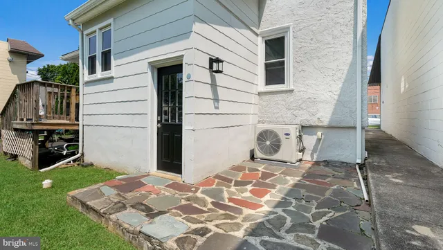 a view of a backyard of the house
