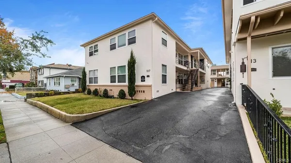 a view of a house with many windows