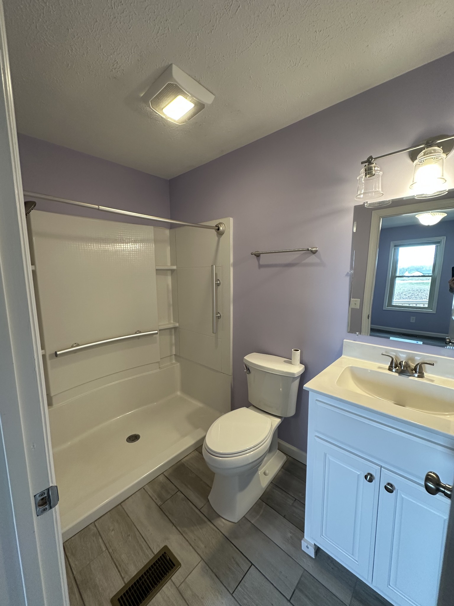 3508 Highway 259 Portland, TN 37148 - Photo 12 of 18 a bathroom with a sink a toilet and shower