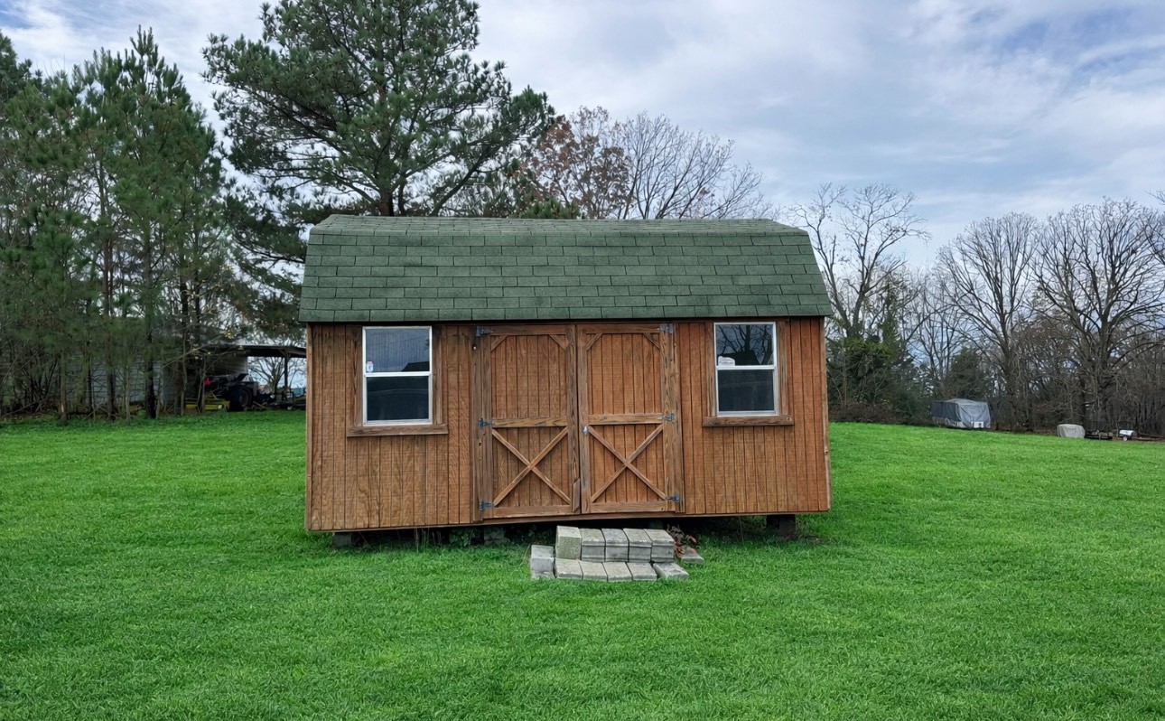 3508 Highway 259 Portland, TN 37148 - Photo 18 of 18 a view of a tiny house with garden