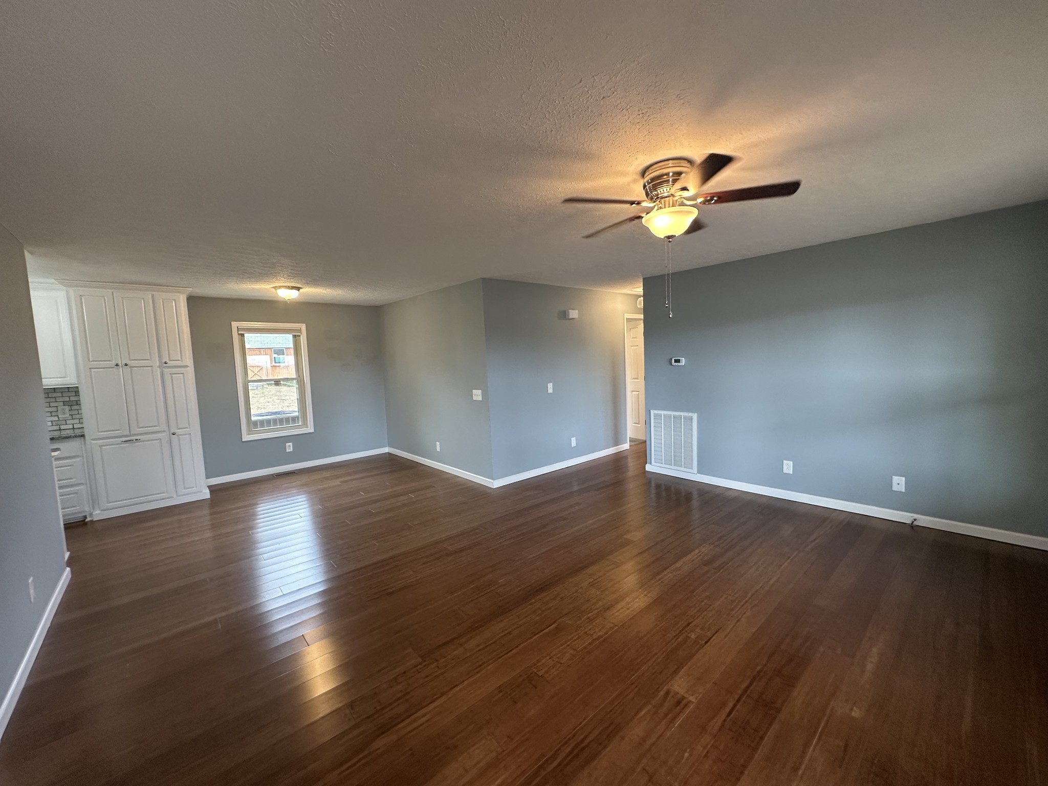 3508 Highway 259 Portland, TN 37148 - Photo 5 of 18 a view of an empty room with window and wooden floor