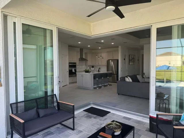 a living room with furniture and a window