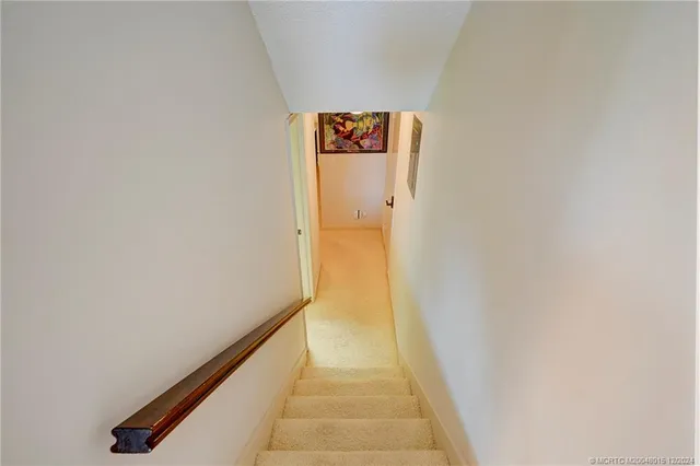 a bedroom with a bed and a desk