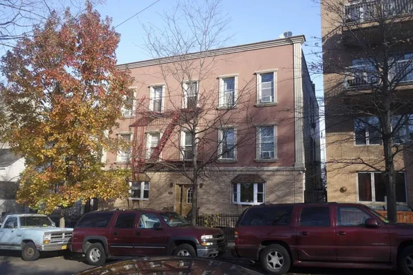 a car parked in front of a building