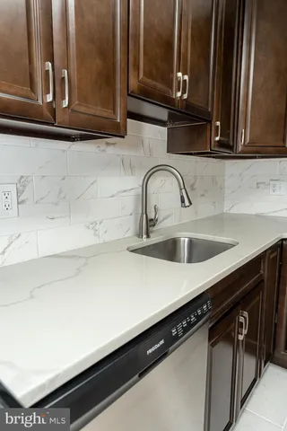 a balcony with wooden floor and fence