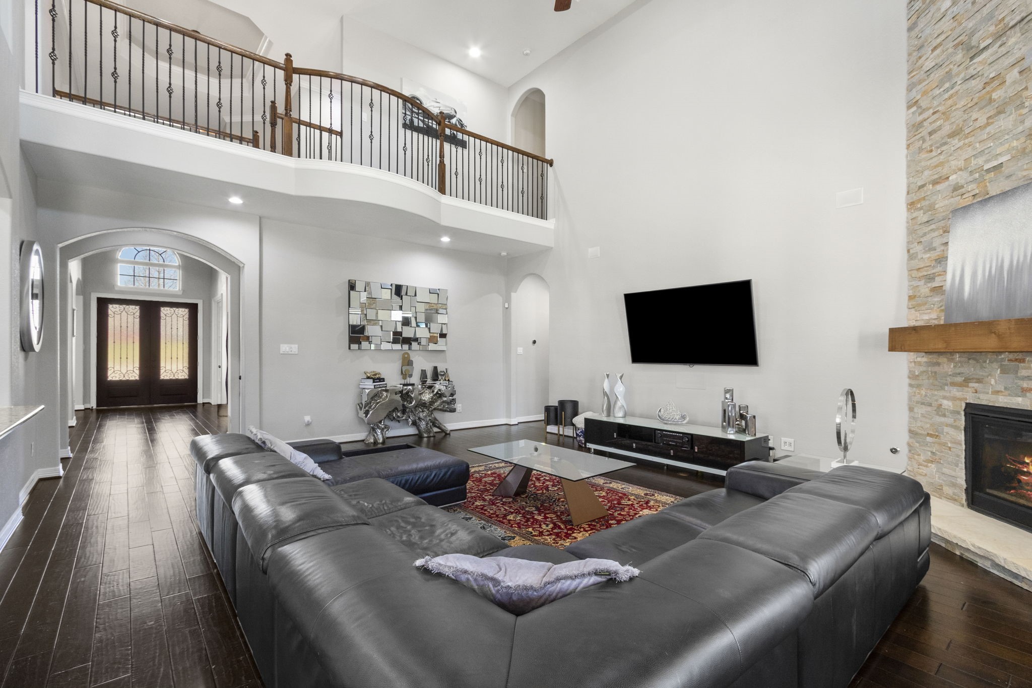 23211 Belted Kingfisher Trail Spring, TX 77389 - Photo 11 of 47 The corner fireplace gives this massive family room a cozy feel