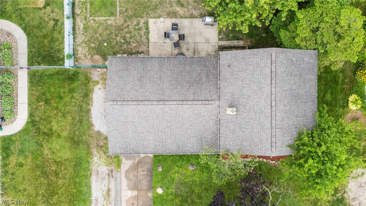 6472 Southgrove Road Mentor, OH 44060 - Photo 36 of 37 Asphalt shingle roof with a central chimney vent