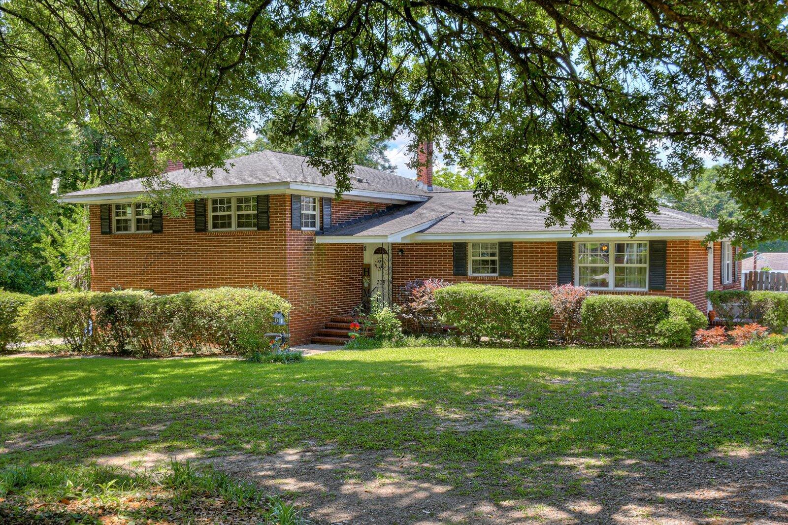 308 5th Street Jackson, SC 29831 - Photo 1 of 70 a front view of a house with a yard and green space