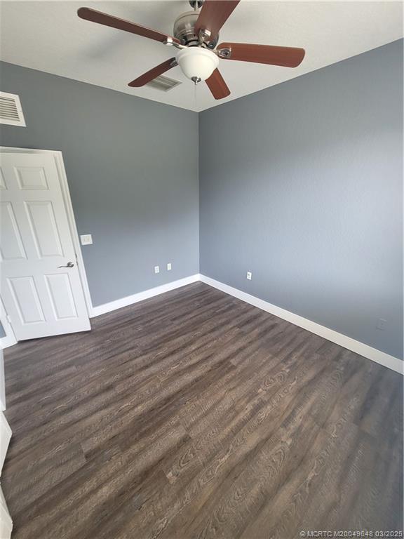 59 Southeast Palermo, Unit 204 Stuart, FL 34994 - Photo 14 of 23 wooden floor in an empty room