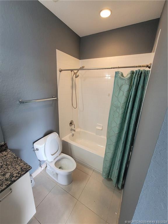 59 Southeast Palermo, Unit 204 Stuart, FL 34994 - Photo 16 of 23 a bathroom with a toilet and a shower
